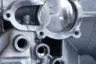 A component with different threaded joints