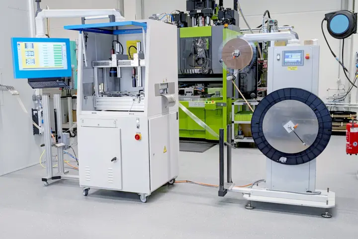 Quality assurance in punching due to optical testing station Quality assurance in punching: The optical testing station KVC 621 from Kistler inspects the punched charger plug components.