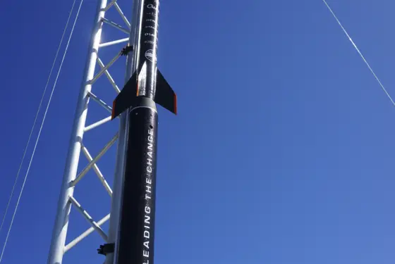 Origin, Faraday Rocketry's rocket, standing in the launch rail just moments before the launch.